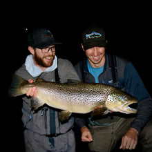 Load image into Gallery viewer, Kyle Glass, fishing guide with his client and a trophy brown trout from the White River in Arkansas